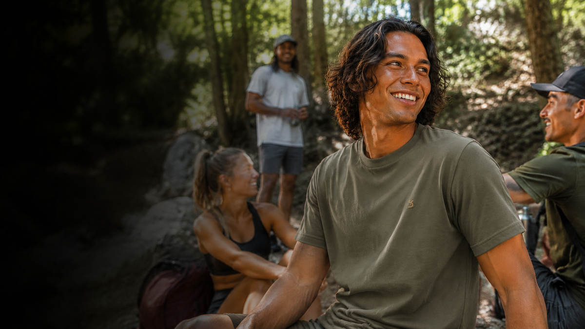 Racrabbit Organic Cotton collection outdoor lifestyle hero with olive organic cotton T-shirt